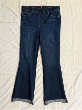 SPANX Sz L Dark Blue Flare Jeans with High Low Raw Hem